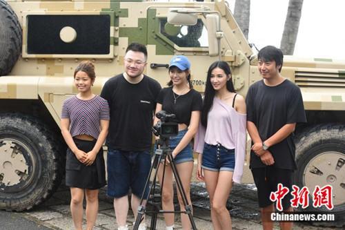 玩装备,凤凰网是认真的《火力无限》三亚开机