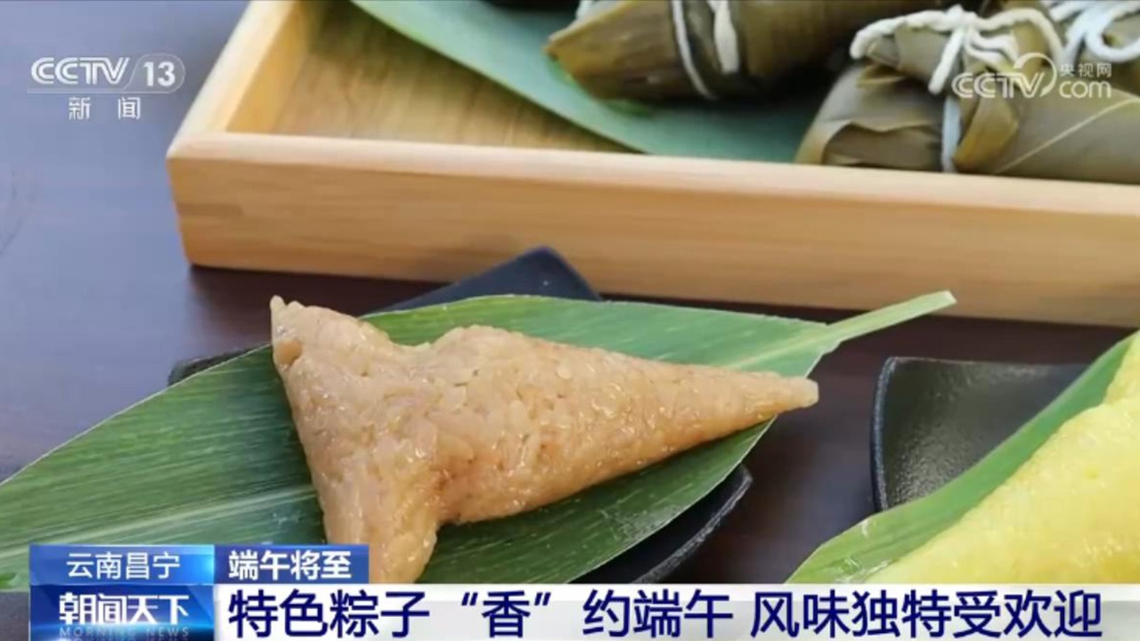 端午将至!龙舟竞渡展现速度激情 特色粽子满足食客味蕾