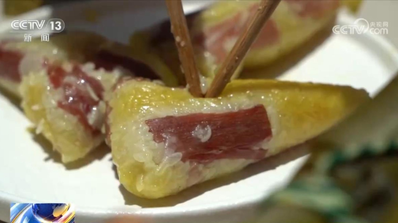 端午将至!龙舟竞渡展现速度激情 特色粽子满足食客味蕾